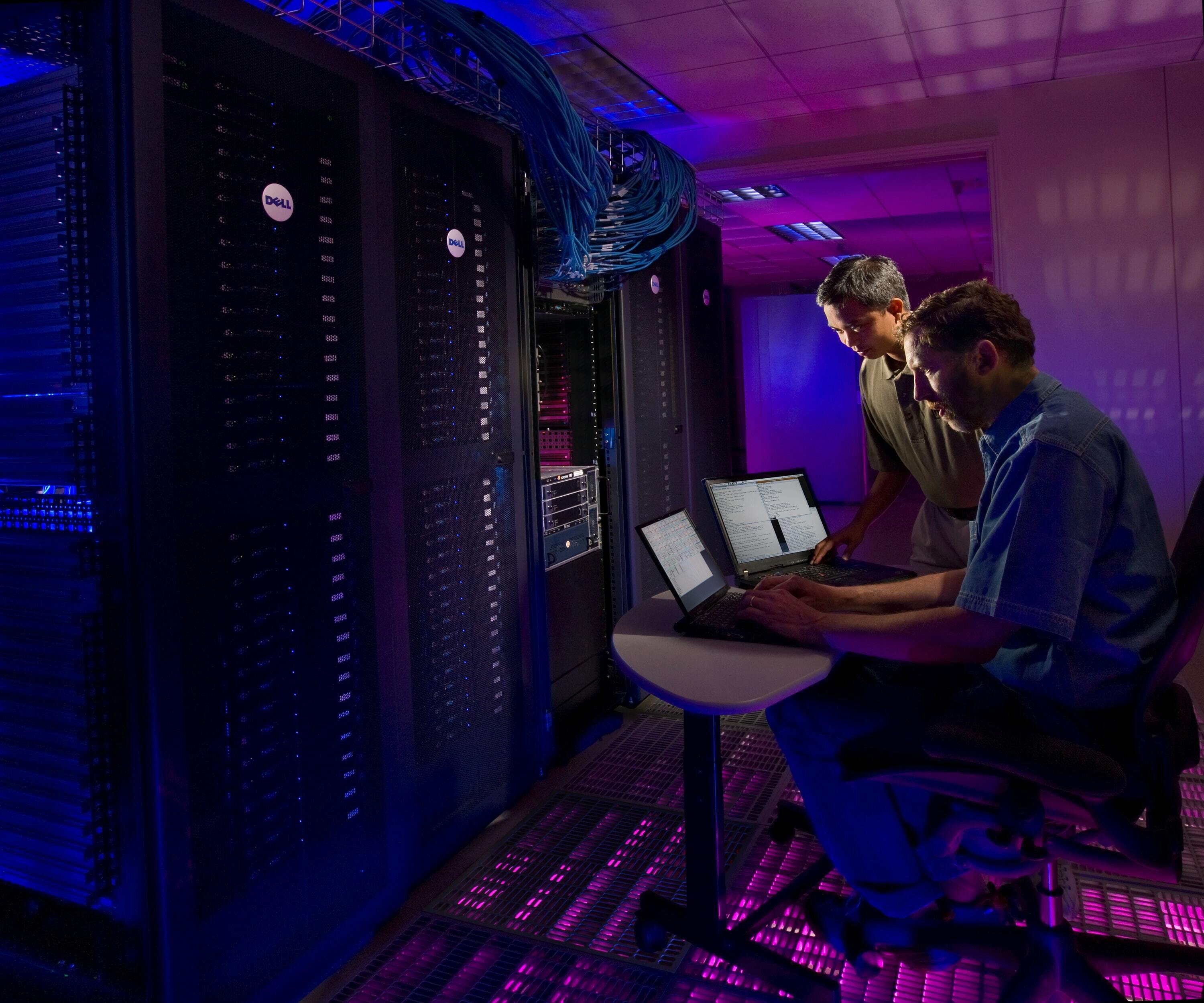 Engineers working on server backup